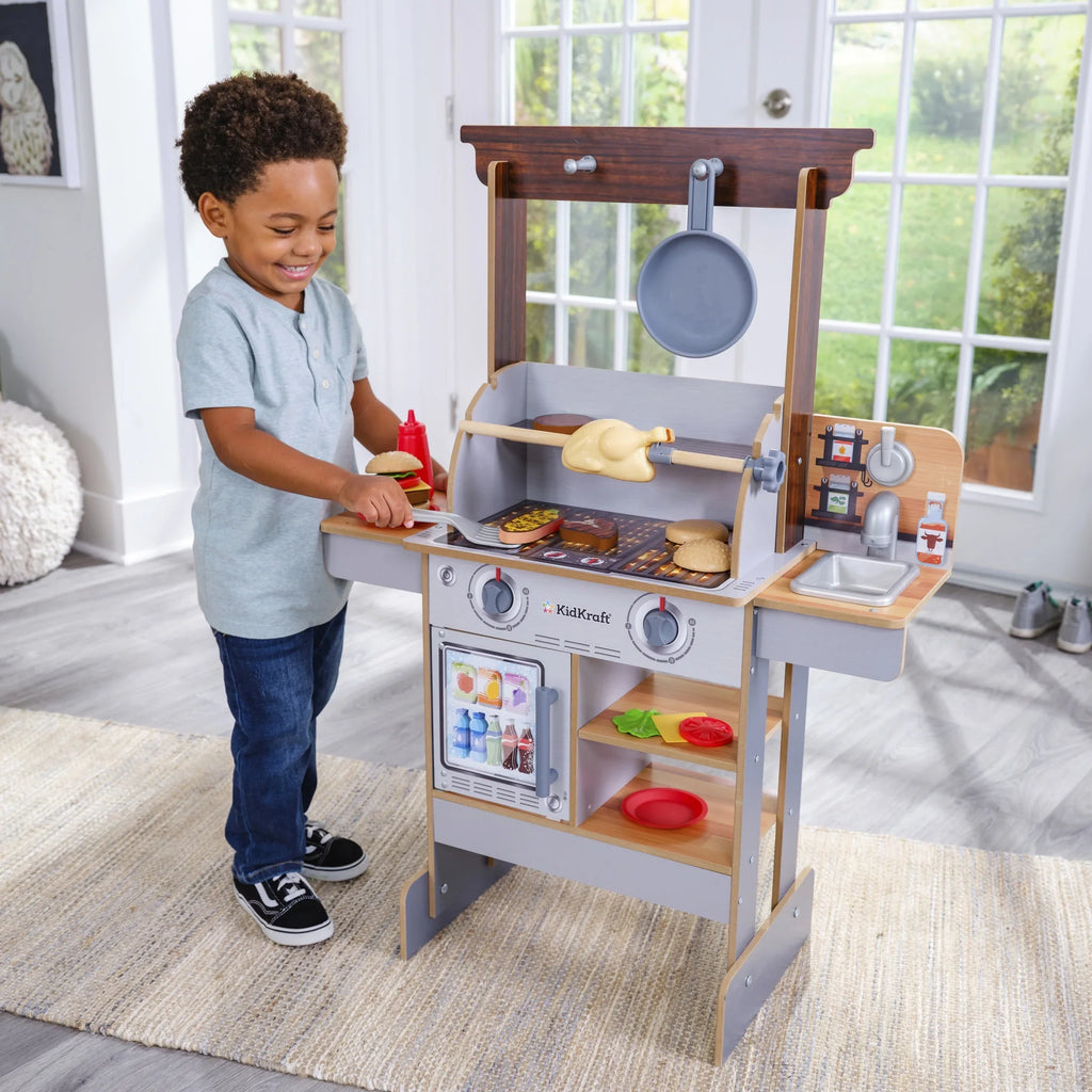 KidKraft Spin & Reveal Wooden Grill & Play Kitchen with Liquid Food & 21 Accessories